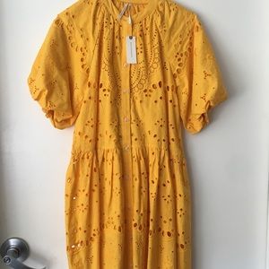 Brand new with tags Anthropologie dress yellow/sunflower color see pics.